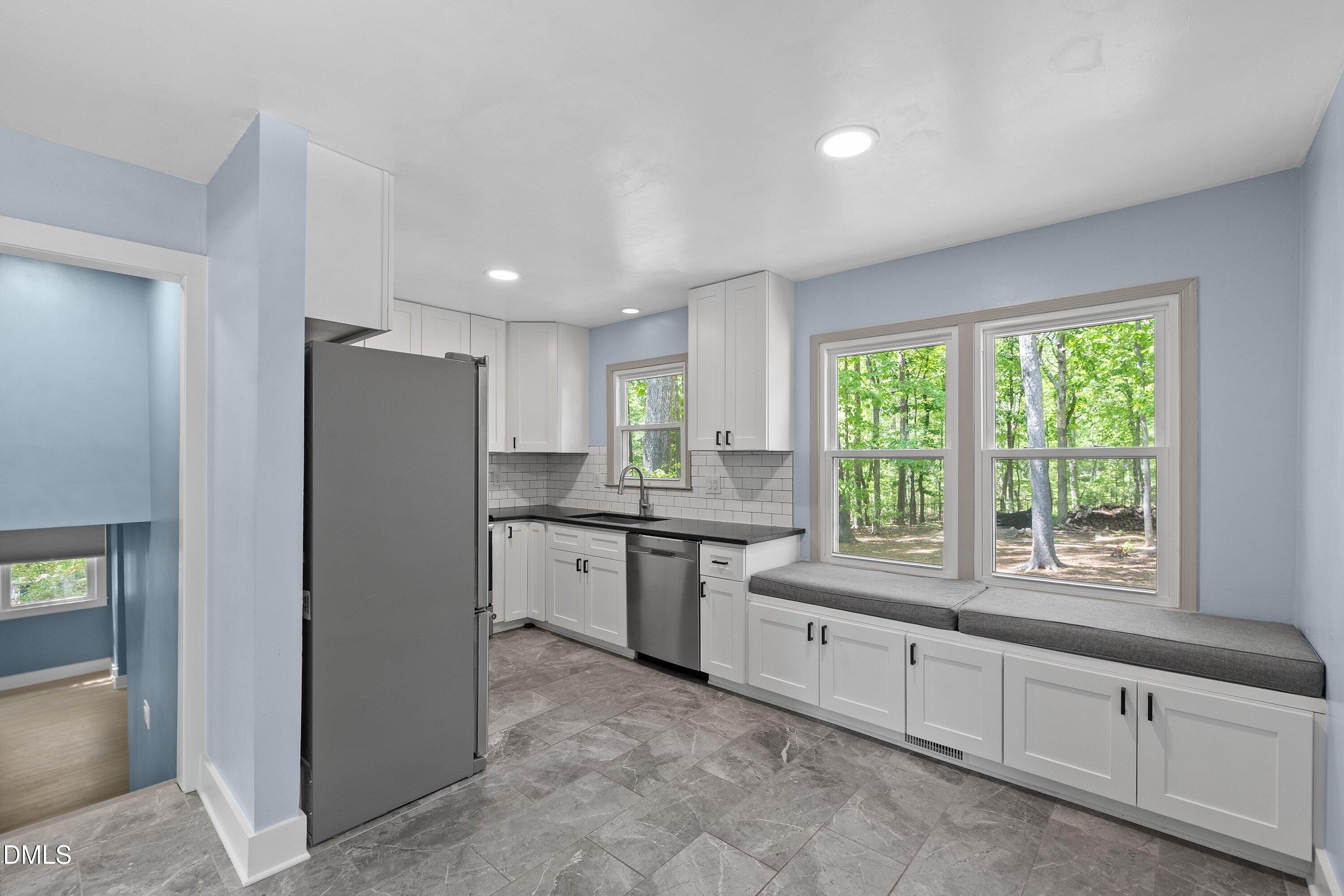 7921 Castlelake Court Raleigh, NC 27615 - Photo 7 of 30 Kitchen / Dining