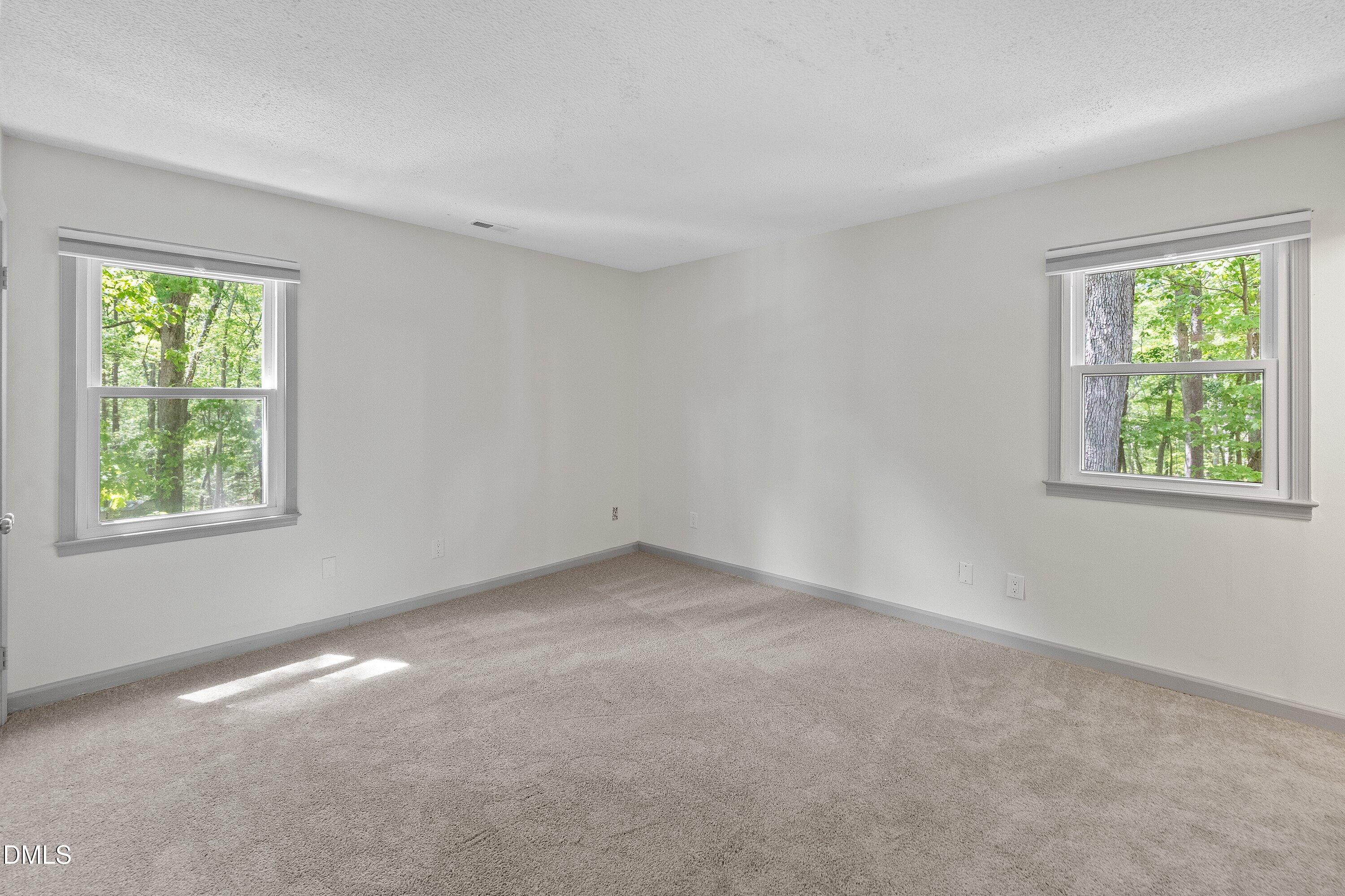 7921 Castlelake Court Raleigh, NC 27615 - Photo 16 of 30 Primary Bedroom