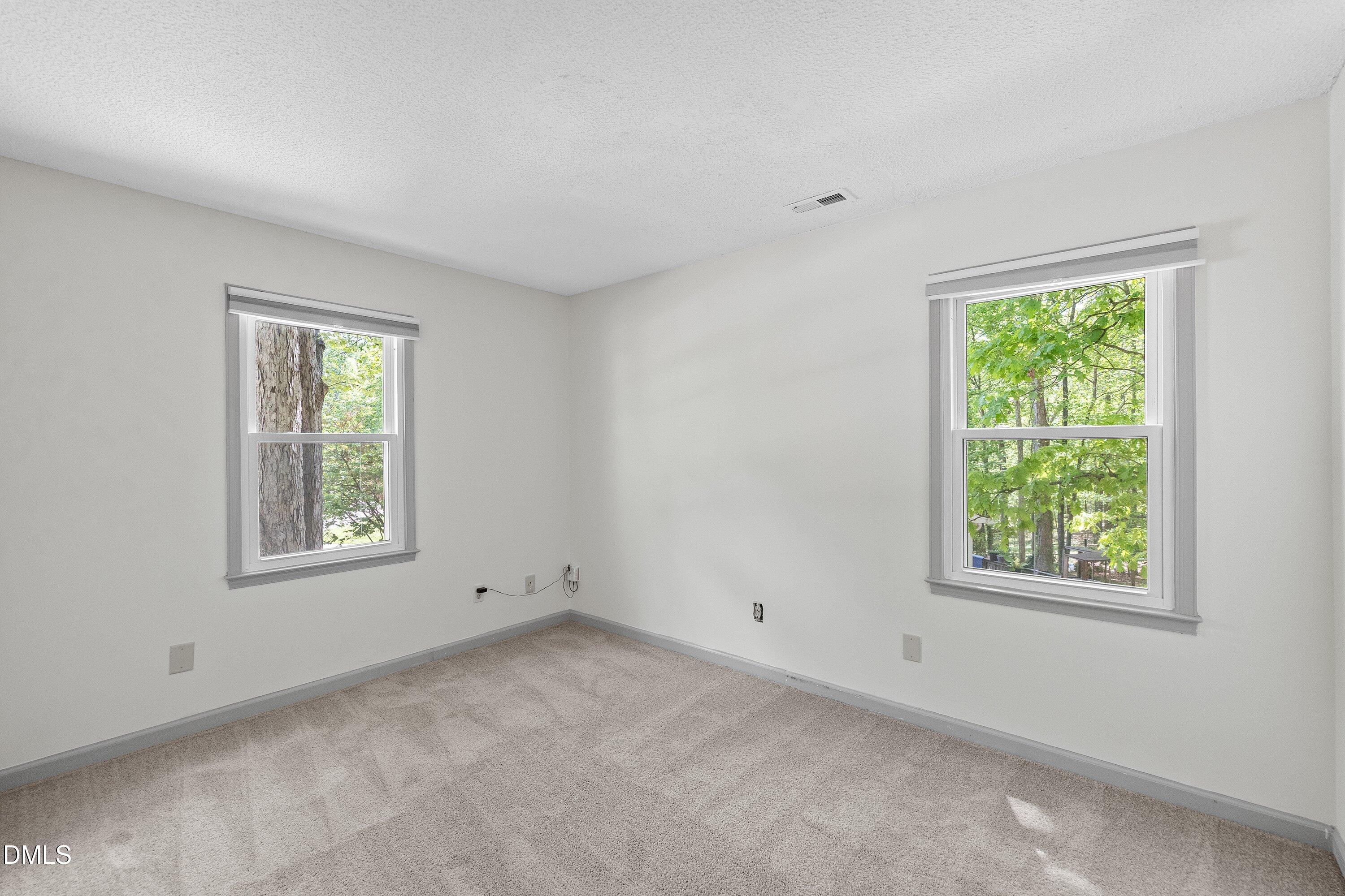 7921 Castlelake Court Raleigh, NC 27615 - Photo 20 of 30 Bedroom 2