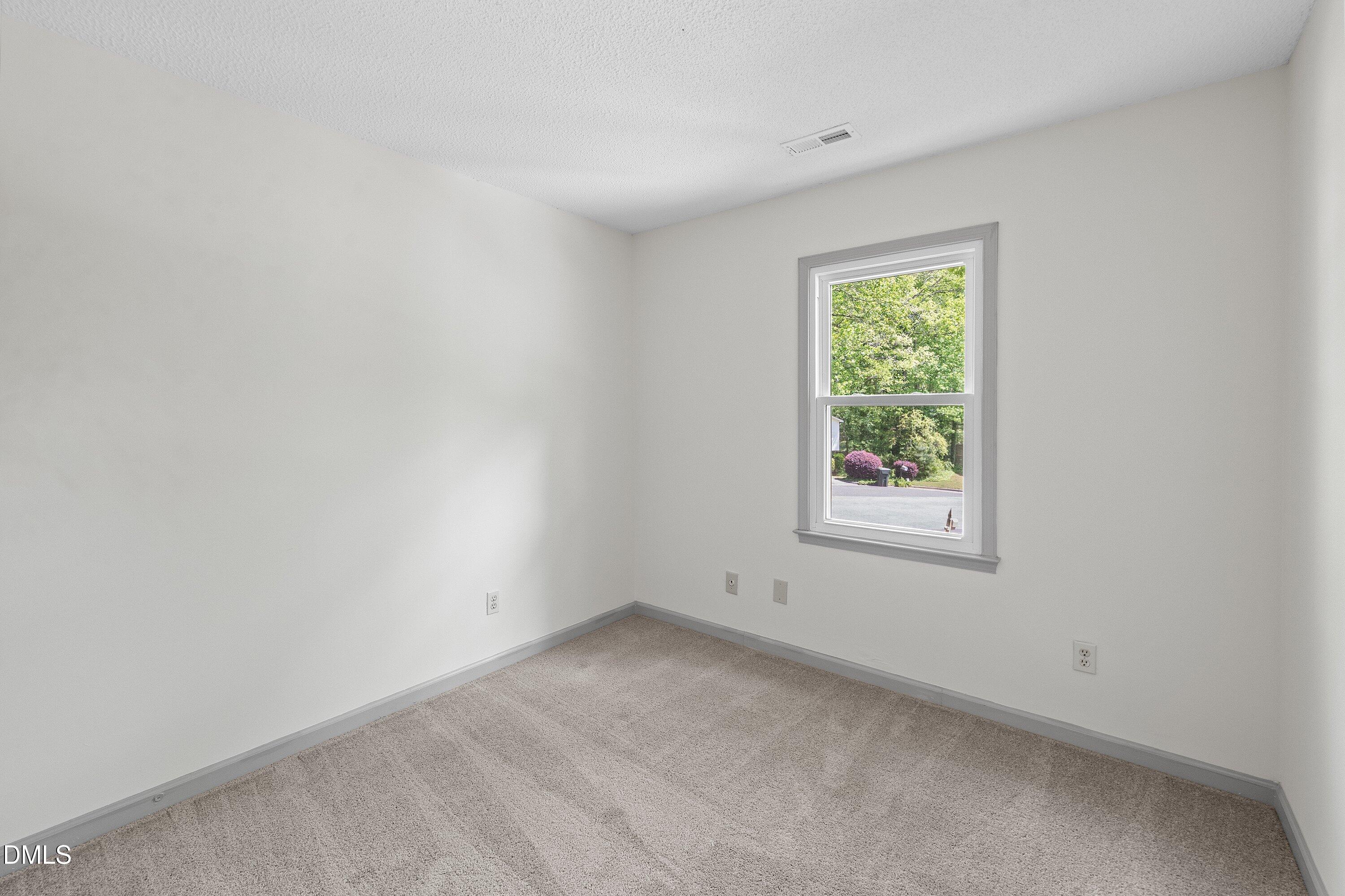 7921 Castlelake Court Raleigh, NC 27615 - Photo 22 of 30 Bedroom 3