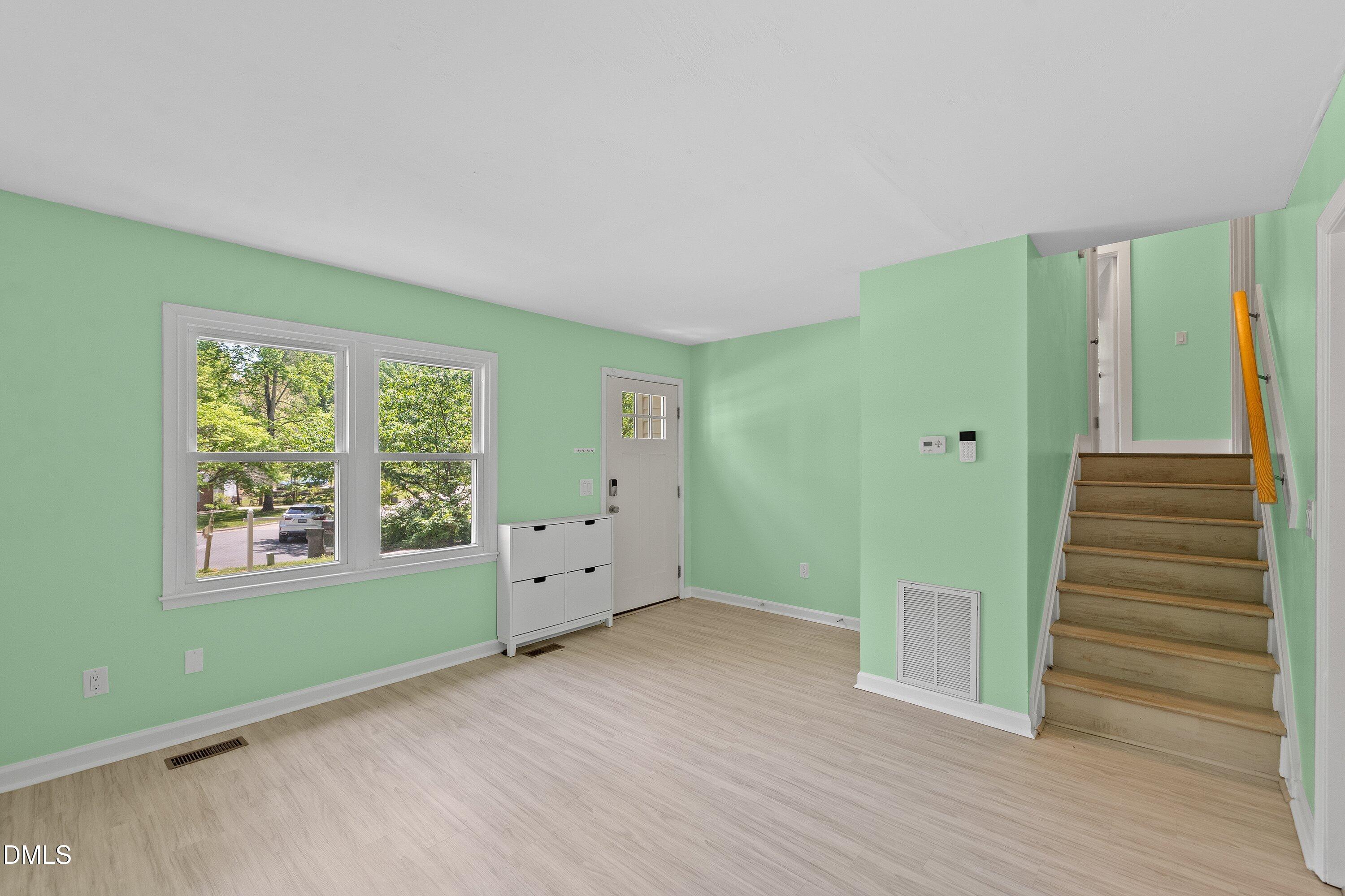 7921 Castlelake Court Raleigh, NC 27615 - Photo 4 of 30 Living Room Entry