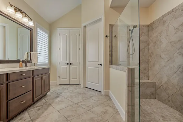 a view of a livingroom with workspace and a couch