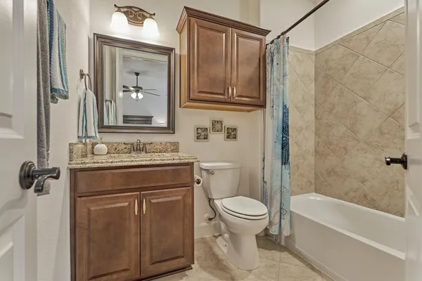 a bedroom with a bed and a table