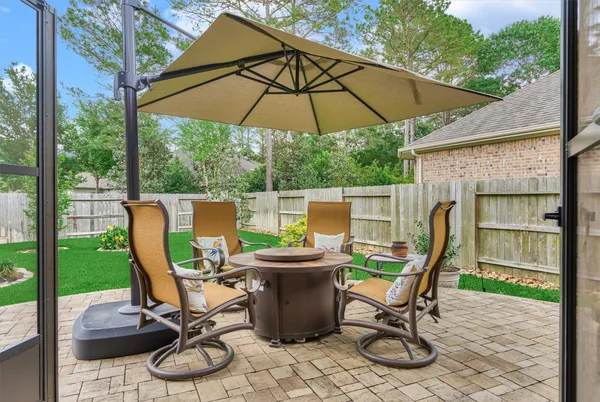 a outdoor living space with furniture and a potted plant