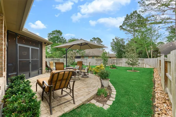 a view of a house with a yard porch and sitting area