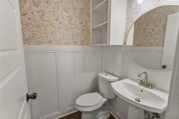 a bathroom with a sink and a toilet