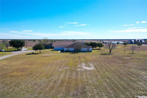 a view of a lake with a city