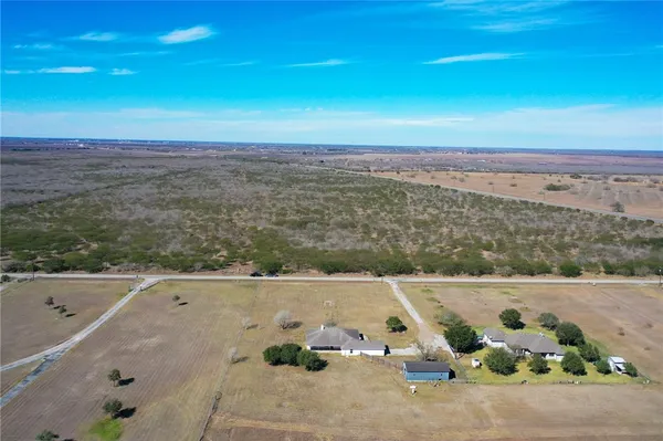 a view of city with ocean