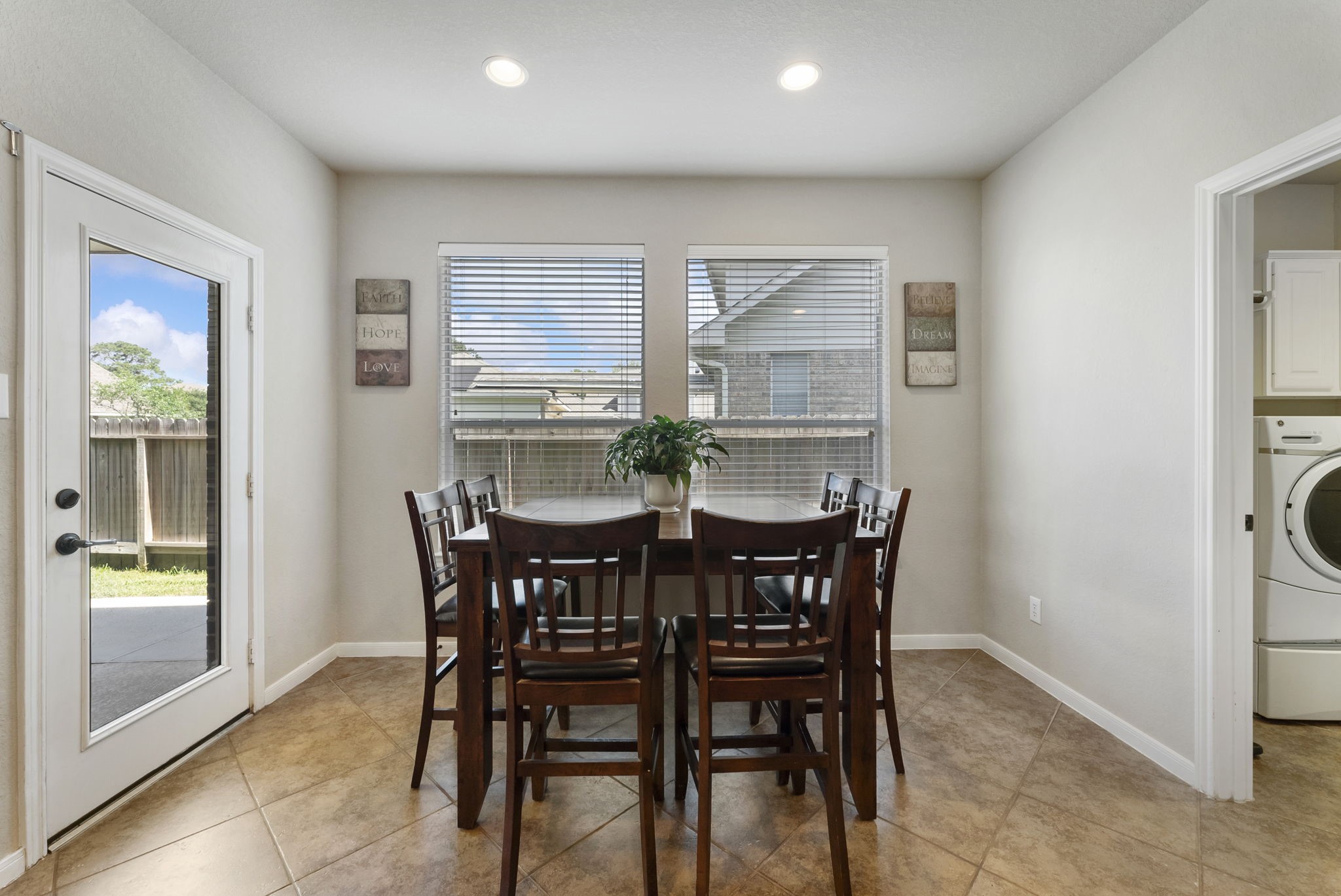 19223 Senterra Lakes Boulevard Spring, TX 77379 - Photo 26 of 48 a view of a dining room with furniture