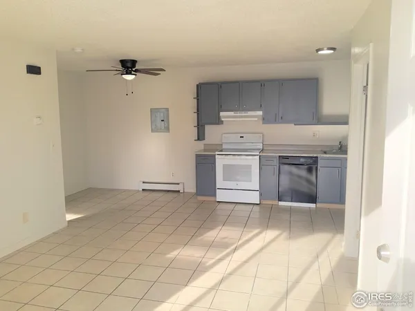 a view of a kitchen with a sink