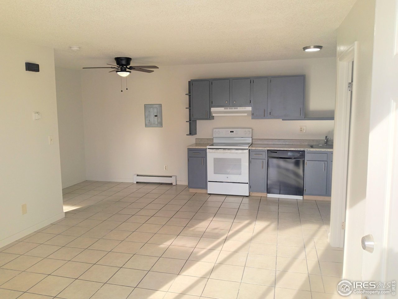 229 15th Street Greeley, CO 80631 - Photo 14 of 19 a view of a kitchen with a sink