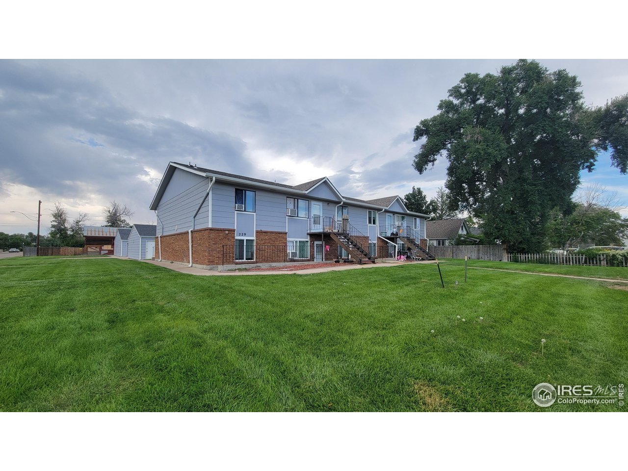 229 15th Street Greeley, CO 80631 - Photo 3 of 19 a black and white photo of a park