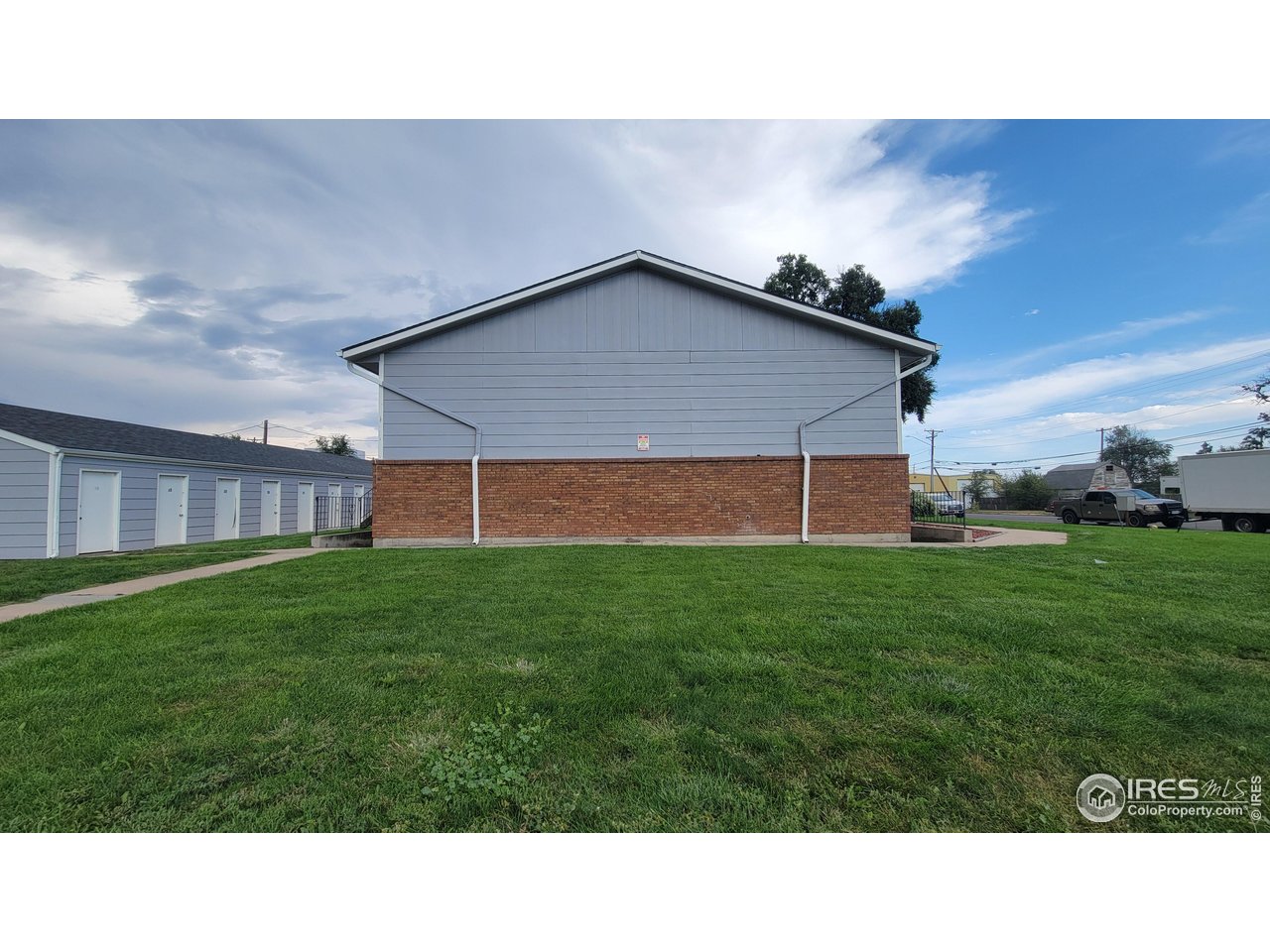 229 15th Street Greeley, CO 80631 - Photo 5 of 19 a black and white photo of a big room