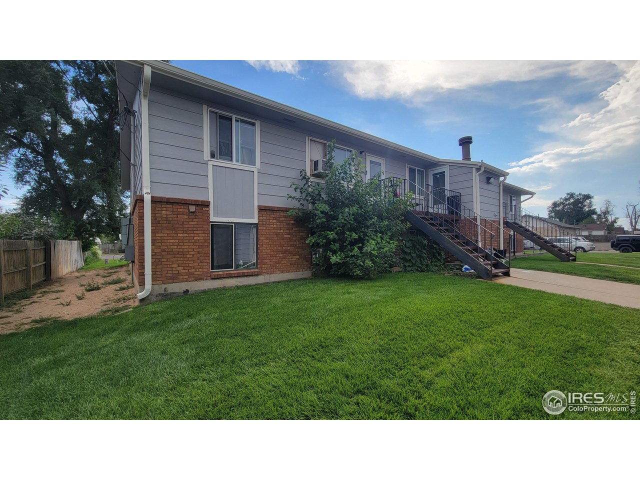 229 15th Street Greeley, CO 80631 - Photo 7 of 19 a black and white photo of a house