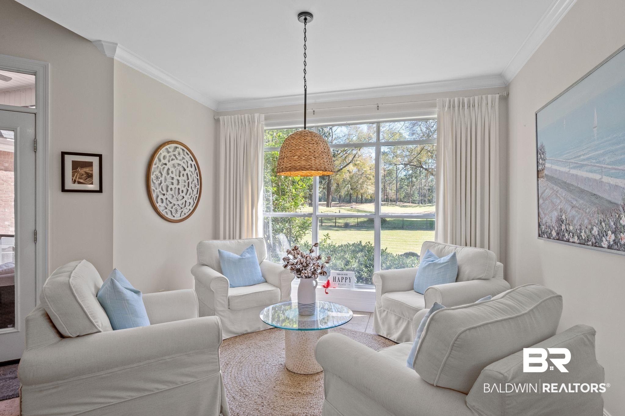 30151 Dolive Ridge Daphne, AL 36527 - Photo 7 of 37 Living area with crown molding and a healthy amount of sunlight
