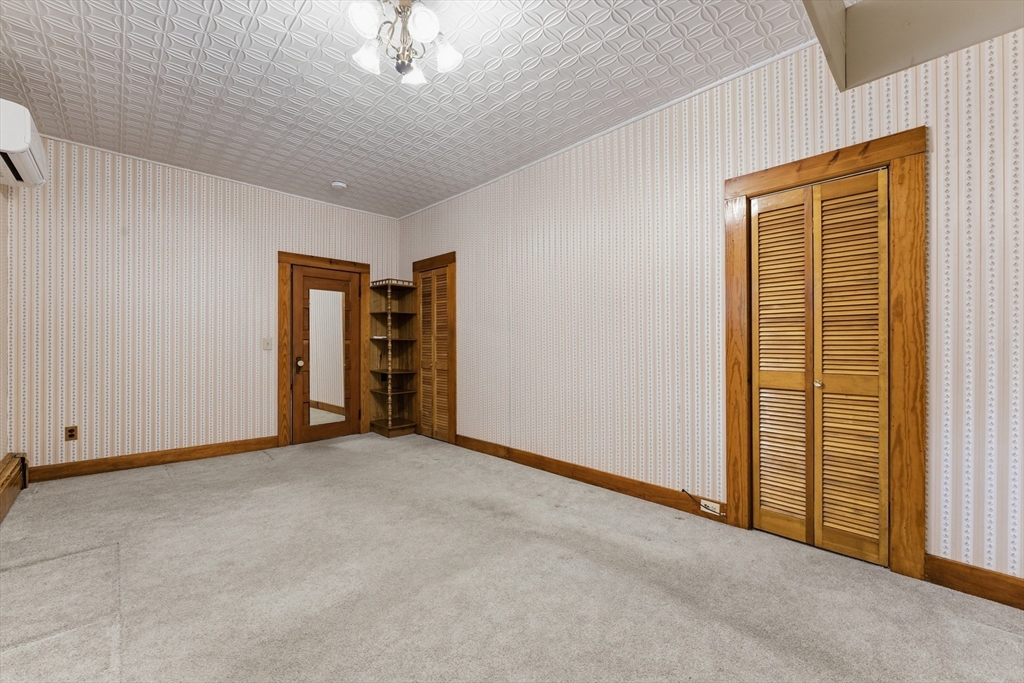 3 River Street Hardwick, MA 01031 - Photo 20 of 36 a view of an empty room with a window