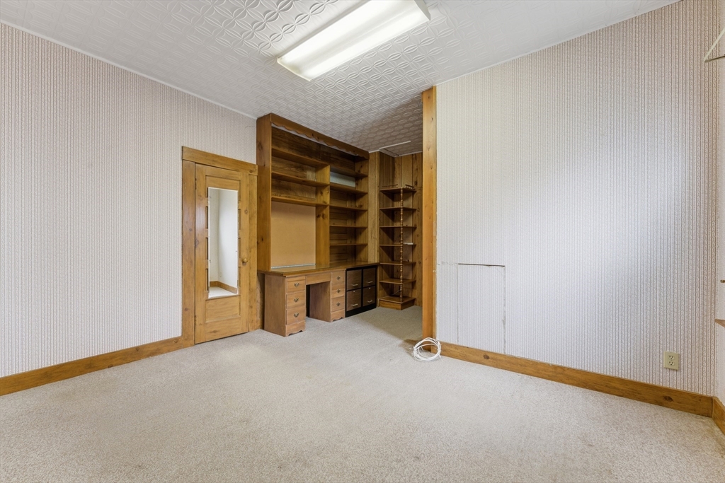 3 River Street Hardwick, MA 01031 - Photo 25 of 36 a view of an empty room with shelves