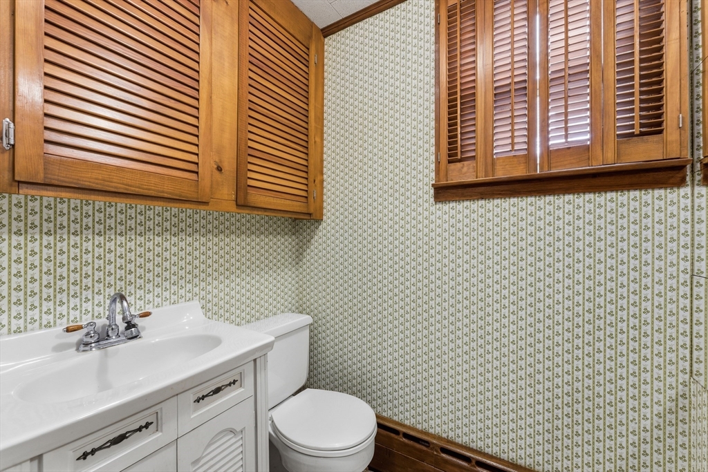 3 River Street Hardwick, MA 01031 - Photo 35 of 36 a bathroom with a sink a toilet and mirror