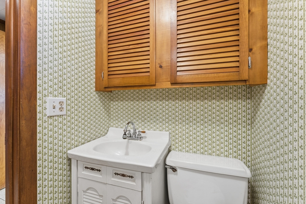 3 River Street Hardwick, MA 01031 - Photo 36 of 36 a bathroom with a sink a toilet and mirror