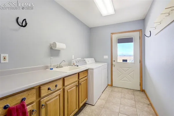 a bathroom with a sink vanity and mirror
