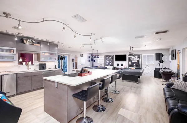 a room with furniture and a view of bedroom