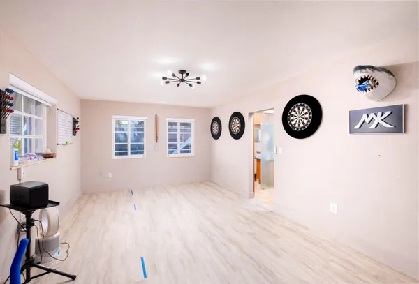 a bed room with a bed and a window