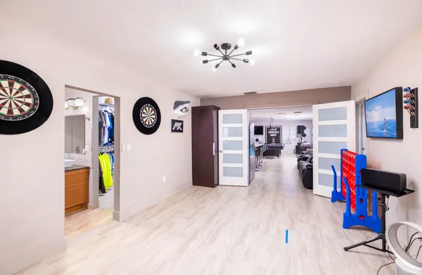 a view of a swimming pool with a yard