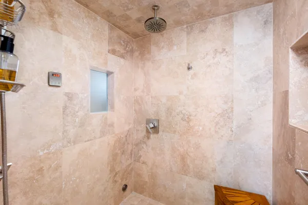 a living room with furniture and a rug