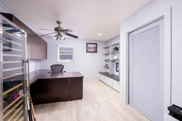 a view of a lake with outdoor seating