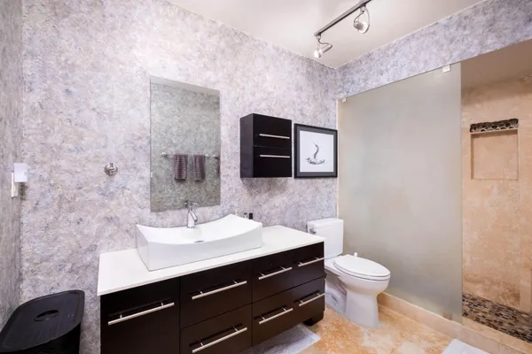 an aerial view of a house with a ocean view