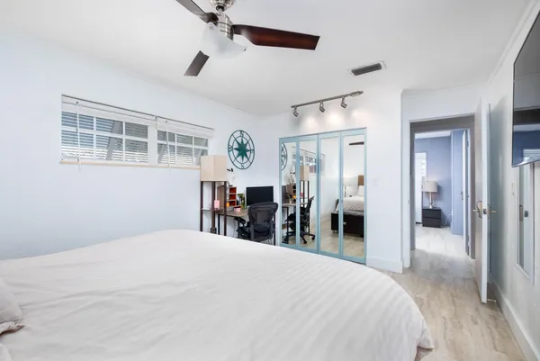 an aerial view of a house with a ocean view