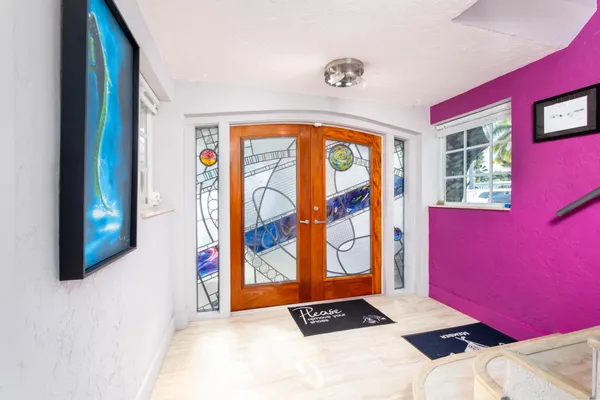 a view of a house with swimming pool