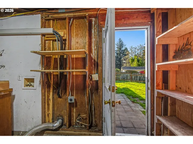 a view of a house with a small yard