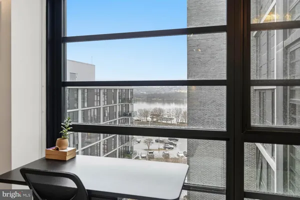 a view of a living room and a window