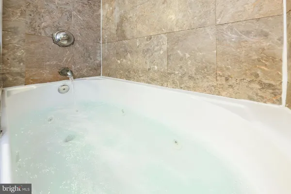a bathroom with a bathtub