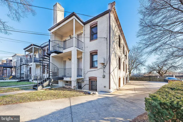 a view of a street in front of a building