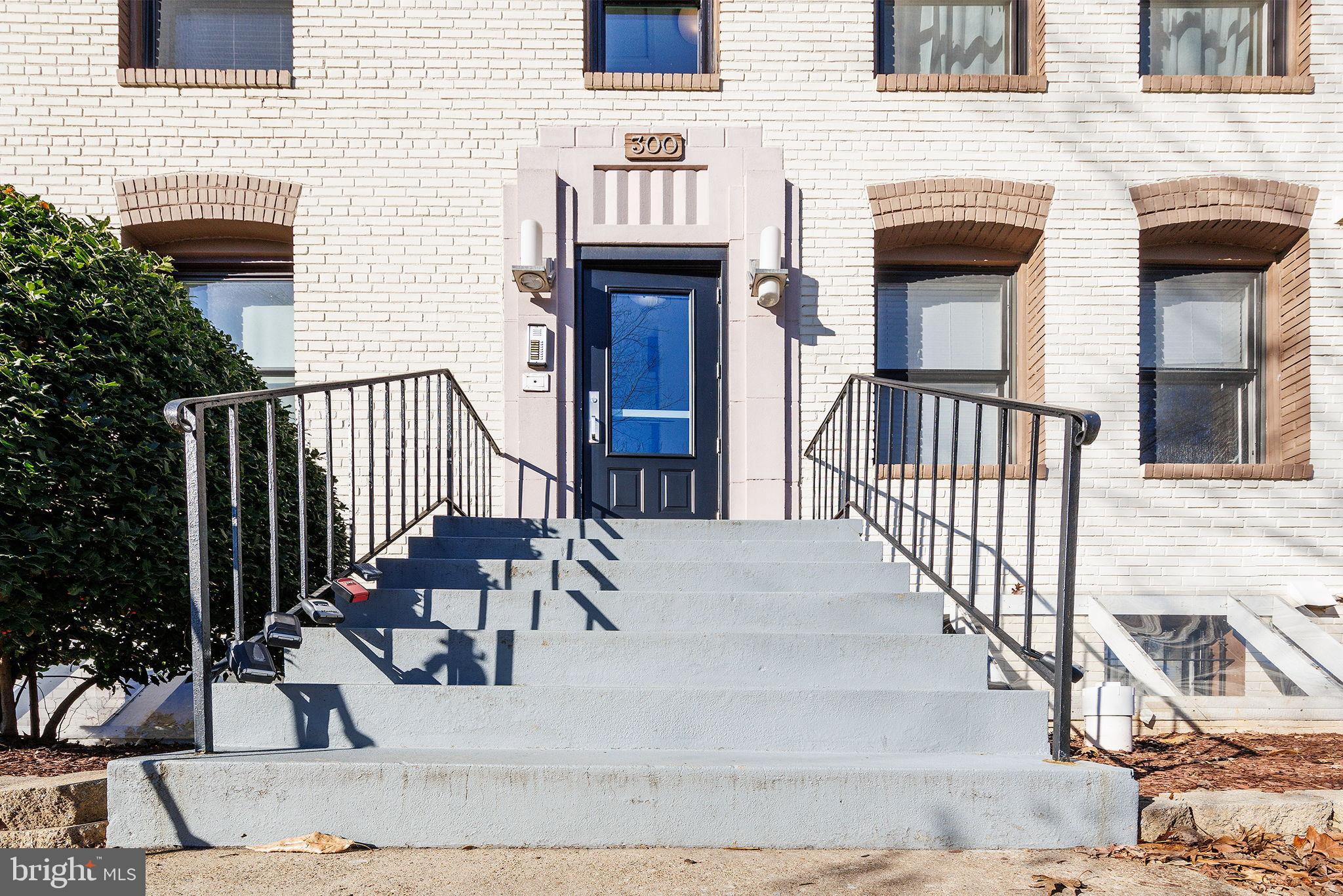 300 Oklahoma Avenue Northeast, Unit 101 Washington, DC 20002 - Photo 20 of 23 a view of a brick house with potted plants