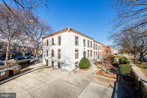 a view of a building with a bench
