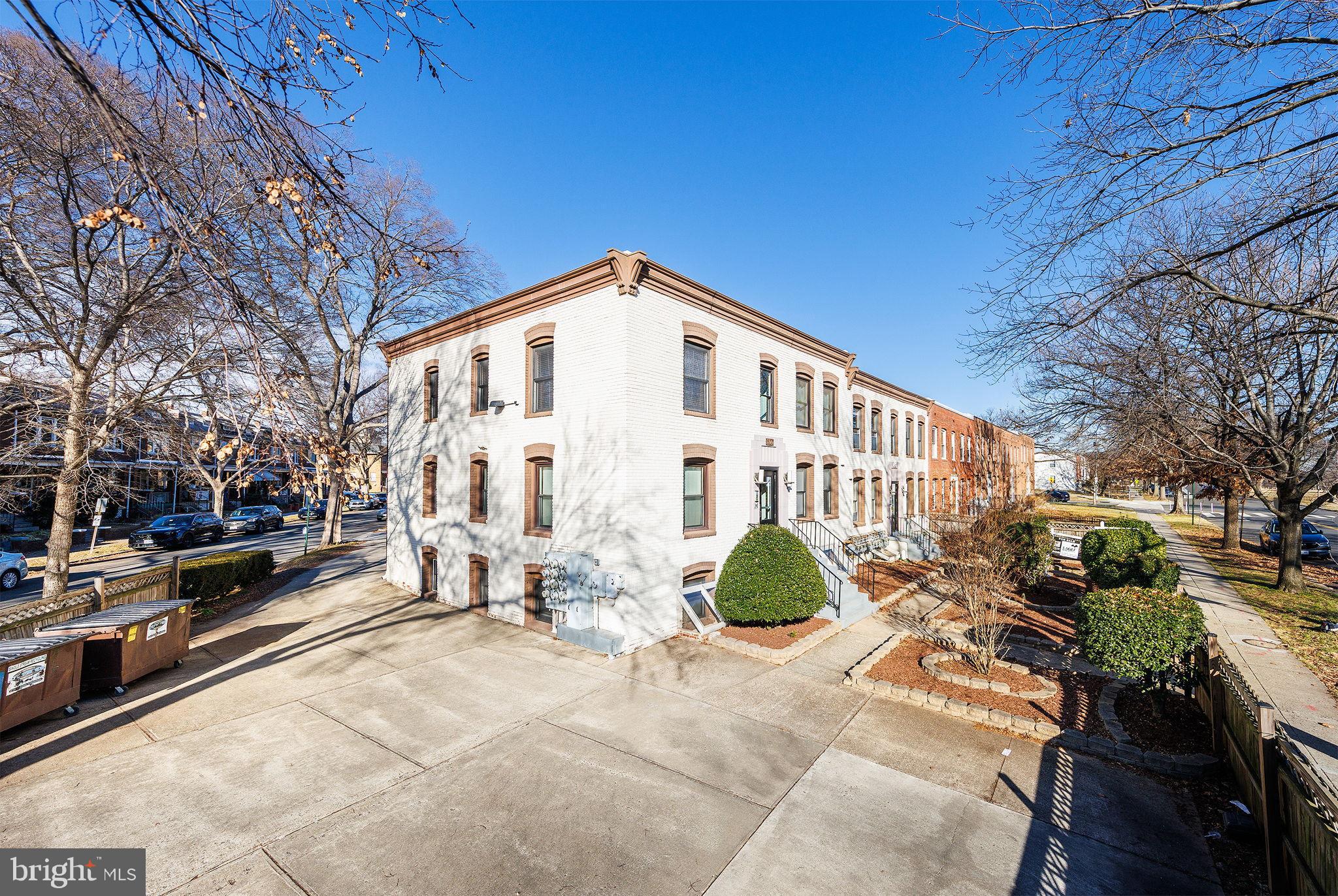 300 Oklahoma Avenue Northeast, Unit 101 Washington, DC 20002 - Photo 23 of 23 a view of a building with a bench
