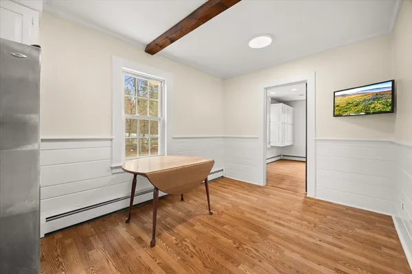 a workspace with furniture and a window