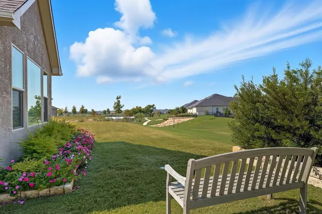 a view of a balcony with lake view