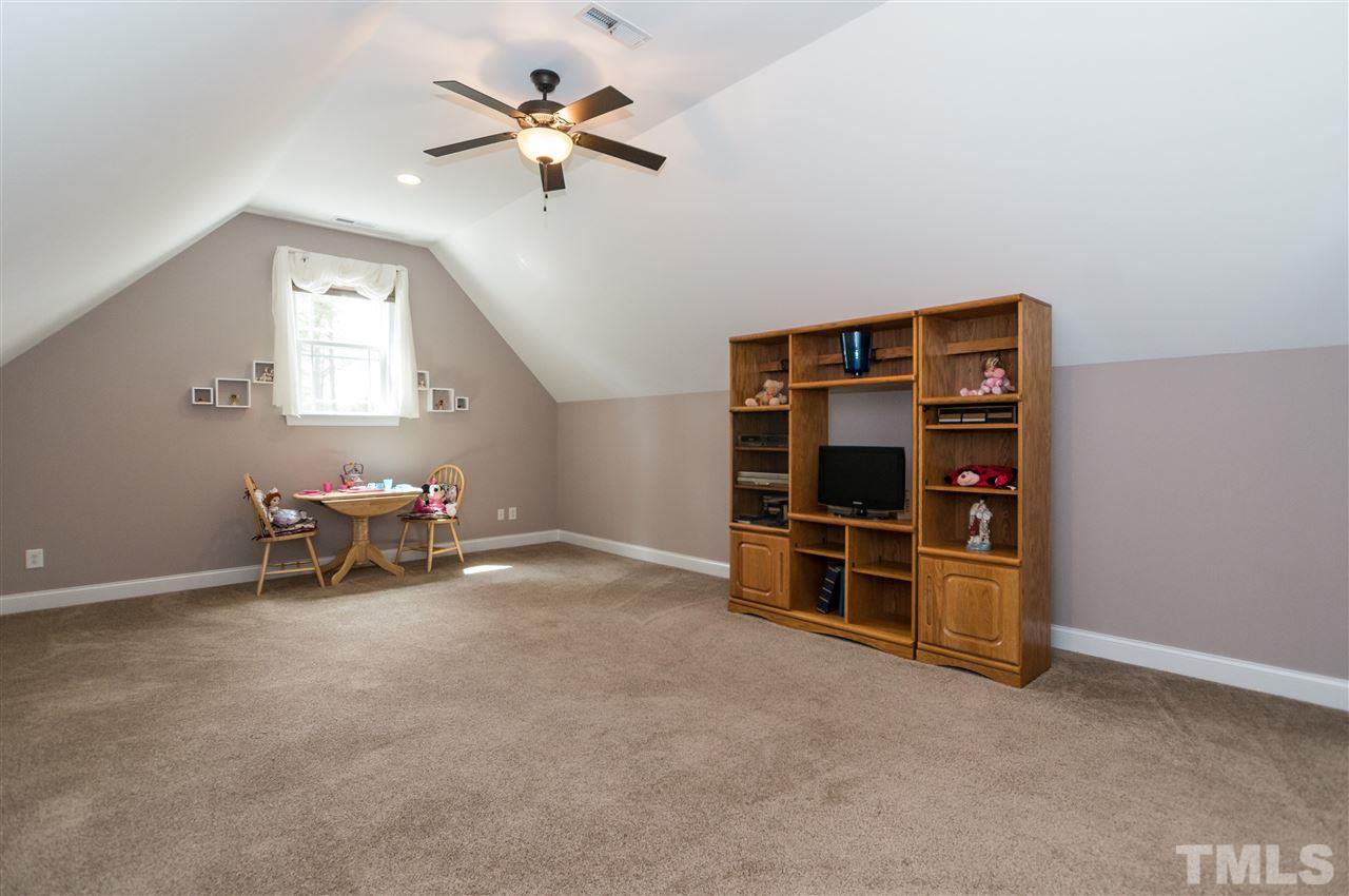 4805 Stoneyoak Lane Raleigh, NC 27610 - Photo 20 of 25 a view of workspace with furniture and window
