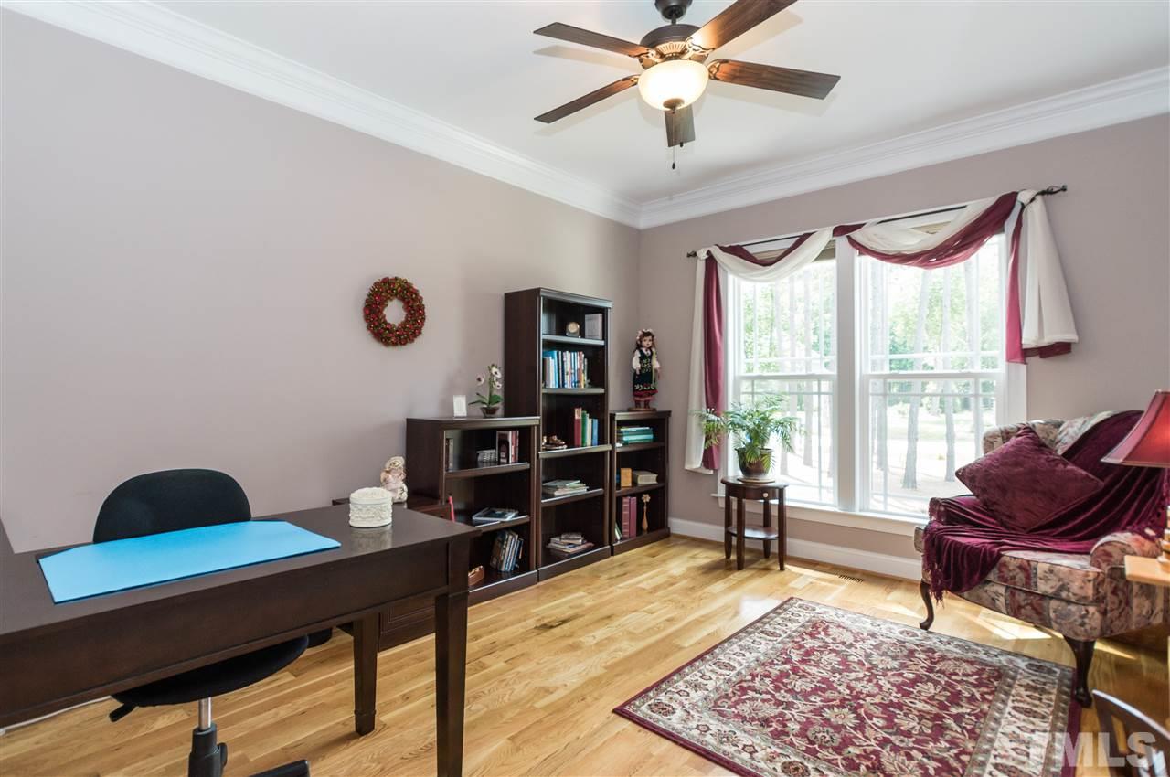 4805 Stoneyoak Lane Raleigh, NC 27610 - Photo 3 of 25 a living room with furniture and a large window