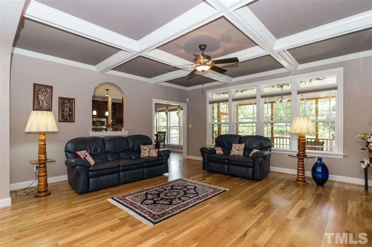 4805 Stoneyoak Lane Raleigh, NC 27610 - Photo 5 of 25 a living room with furniture and a large window
