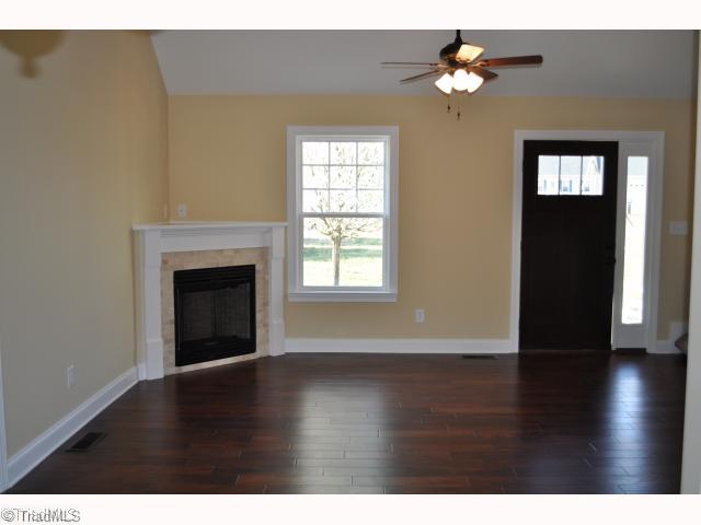 2501 Old Linwood Road Lexington, NC 27292 - Photo 4 of 12 Living Room. w/new gas log fireplace and hardwood floors