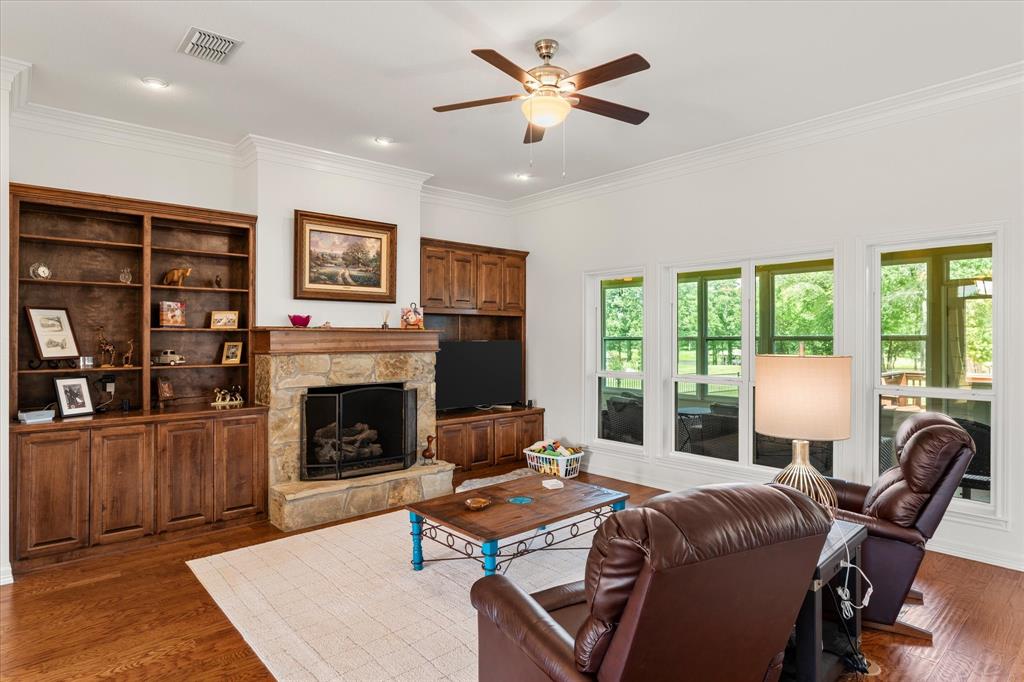 345 Rains County Road 3390 Emory, TX 75440 - Photo 11 of 39 a living room with furniture fireplace and window