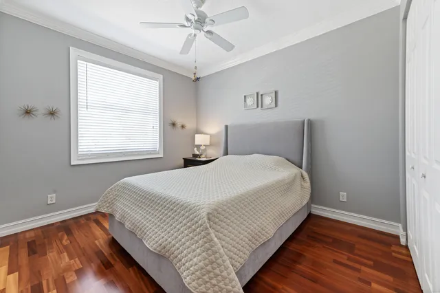 a bathroom with a double vanity sink mirror and toilet