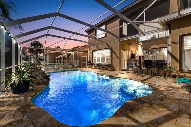 a view of a swimming pool with a couch