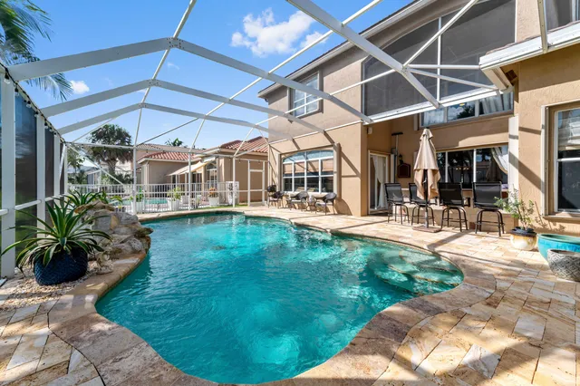 an aerial view of a house with a garden
