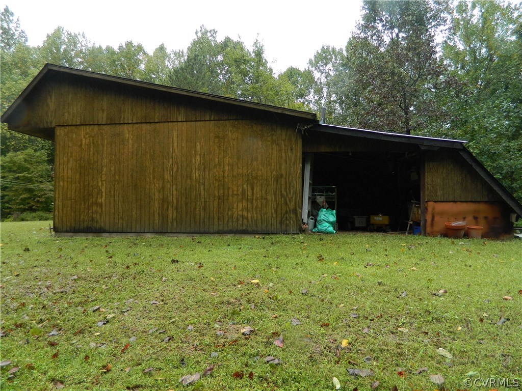22929 King William Road West Point, VA 23181 - Photo 21 of 23 equipment storage lean-to on rear of shed/workshop